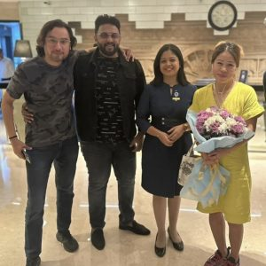 Guests celebrating together with flowers at a hotel venue